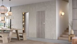 Drzwi wewnętrzne w kolorze dębu. Jak dopasować je do koloru podłogi i aranżacji mieszkania?  